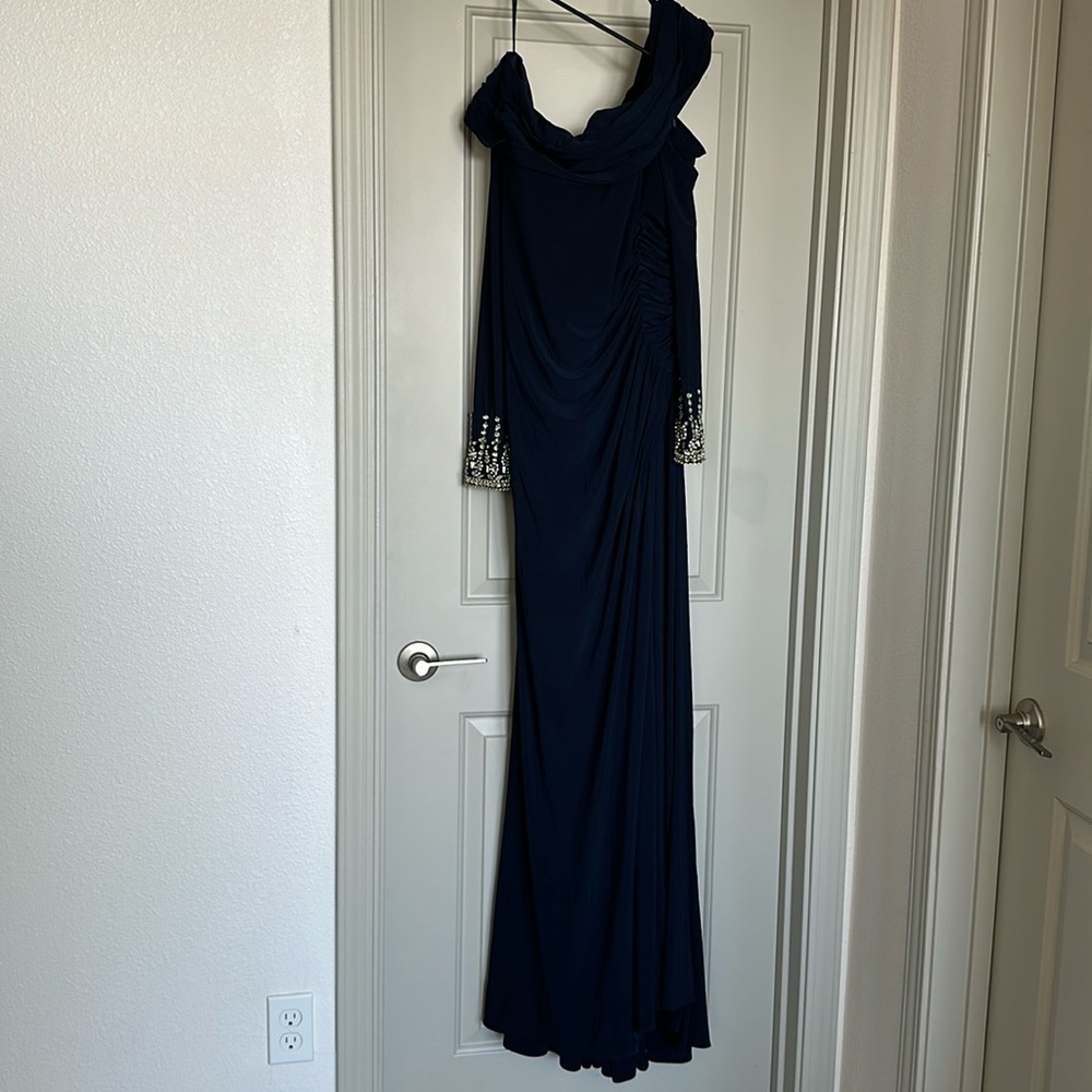 Beautiful Mac Diggal evening gown with slit. Navy blue new with tags. Size 10